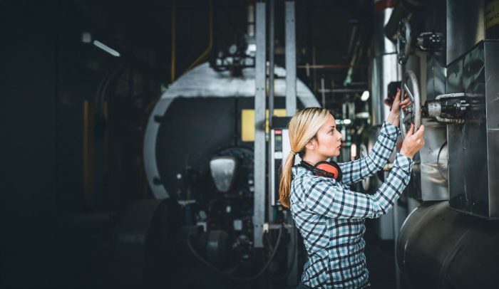 Engineer at boiler house valve